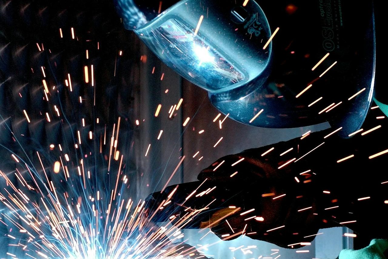 Person welding with proper safety equipment